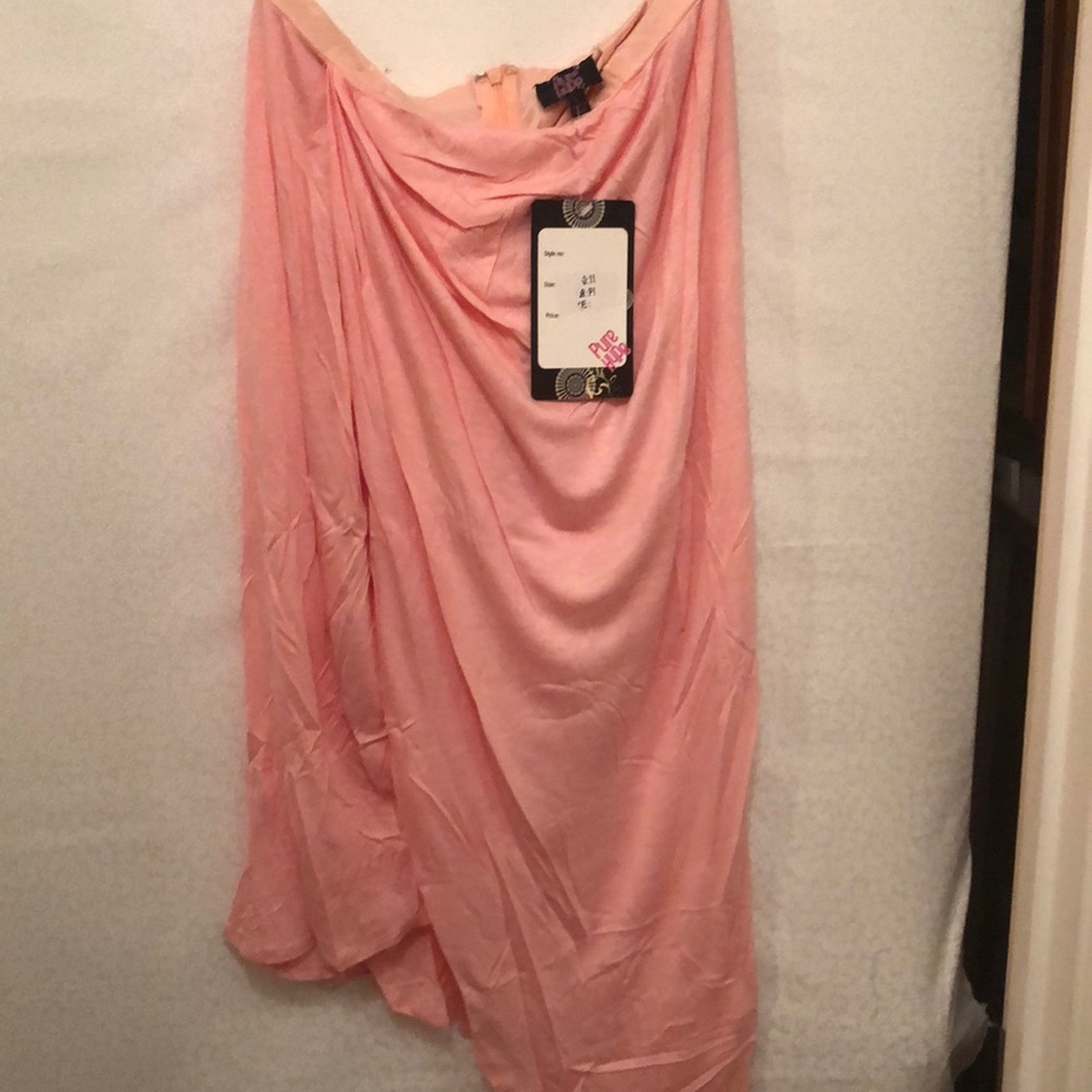 Asymmetrical hem pink skirt